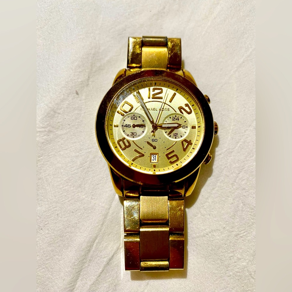 MICHAEL KORS WATCH, GOLD. DOES NOT WORK.